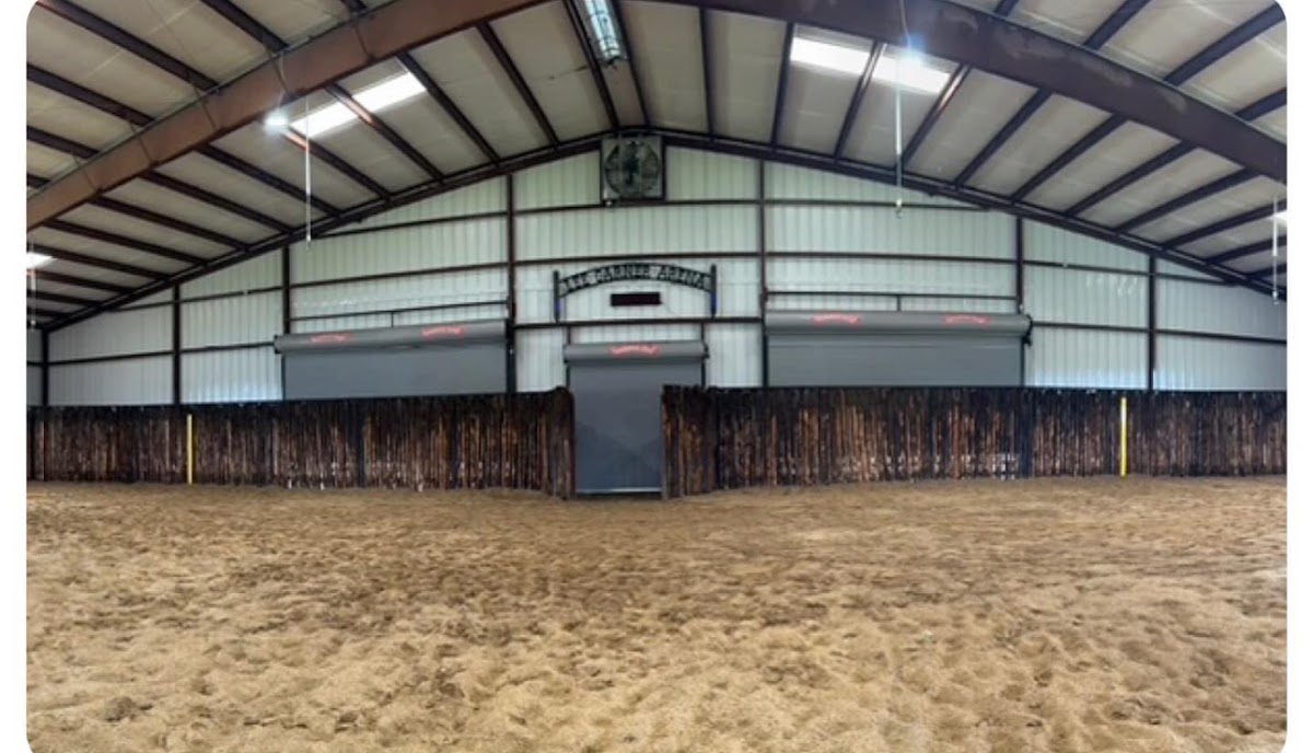 Inside a covered riding arena with cleaned walls